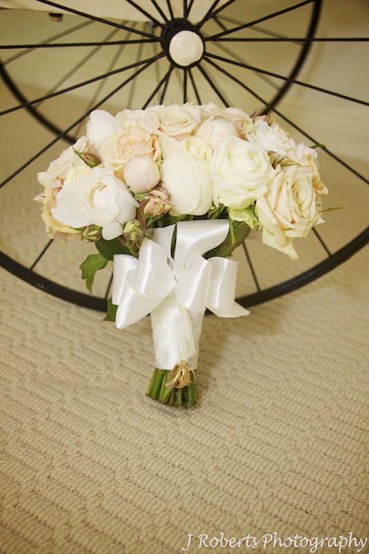 Bridal bouquet with family wedding rings attached - wedding photography sydney
